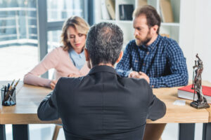 couple having meeting with lawyer